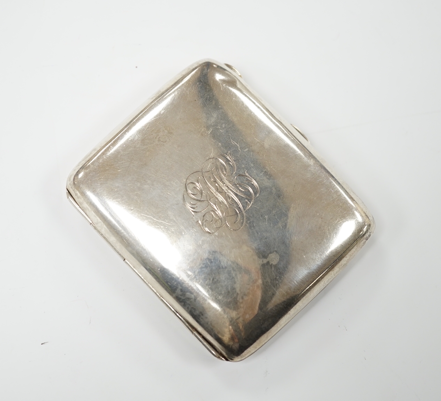 A George V silver cigarette case, Birmingham 1918, 8.5cm, 99 grams